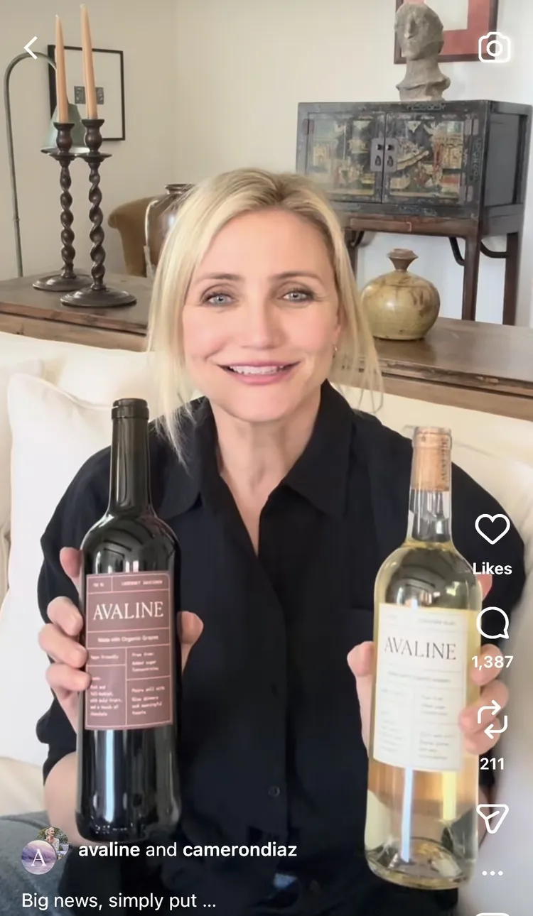 Cameron Diaz Instagram video Avaline wine cream couch black linen top medium wash jeans maroon glasses 2026