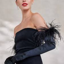 EVENINGWEAR — FEATHERED GOWNS AND OPERA GLOVES